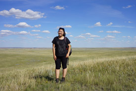 All smiles while posing in front of the picturesque prairies (Photo by NCC)